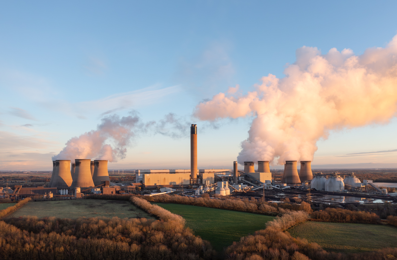 Drax coal fired power station in UK with coal stack and biofuel storage tanks for clean energy production