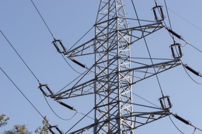 electric power lines and pylon on blue sky